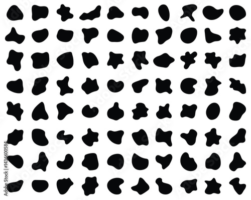 Random irregular shapes of organic black blobs on a white background