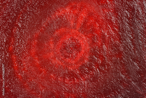 Obraz na płótnie A close-up shot reveals the deep red and textured surface of a sliced beetroot, showcasing its concentric rings w salonie