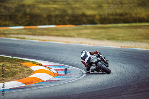 Motorcycle race, rear view. Speed, circuit racing. Motorbike sport