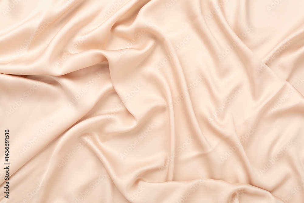 Fototapeta premium Beige silk fabric texture as background, top view