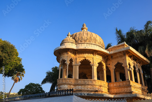 Historic Jagmandir temple in Udaipur, Rajasthan, India. built on an island in the Lake Pichola during sunset.