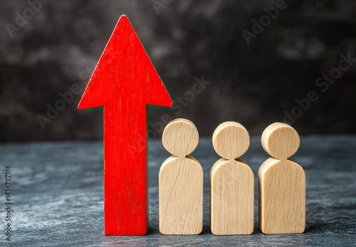 Growth and team success.  Wooden figures align beneath a large red arrow