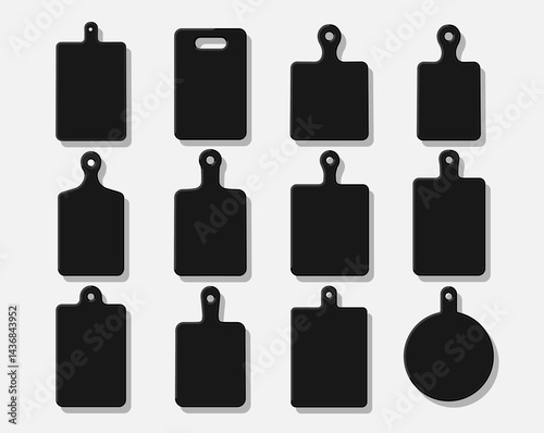 Set of twelve black cutting boards in diverse shapes and sizes, each equipped with a handle and a hole for easy hanging. Ideal for kitchen, culinary, and restaurant-related themes.