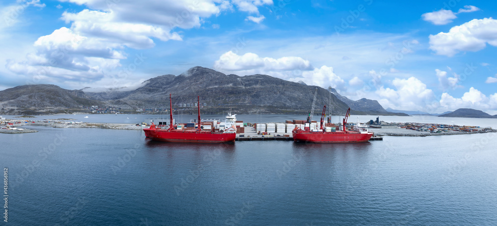 International shipping line transportation container cargo ship in Nuuk Port in Greenland
