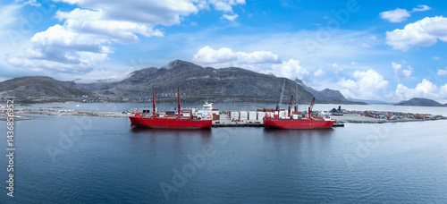 Obraz na płótnie International shipping line transportation container cargo ship in Nuuk Port in Greenland w salonie
