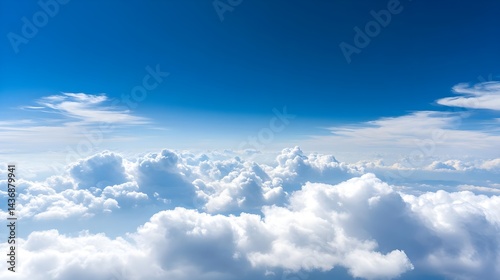 Breathtaking Aerial View of Fluffy White Clouds against Blue Sky