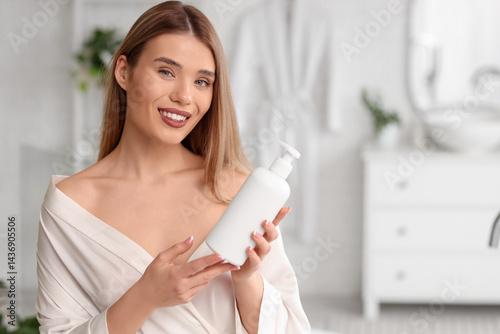 Pretty young woman with bot...