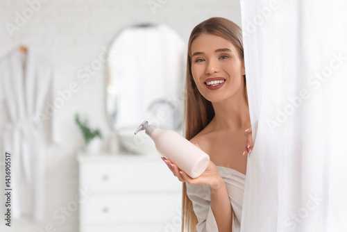 Pretty young woman with bot...