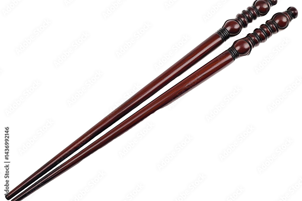 Pair of decorative wooden chopsticks Ornate handles with carved details Rich, dark reddish-brown hue Pair of decorative wooden chopsticks Ornate handles with carved details Rich, dark reddish-brown hue