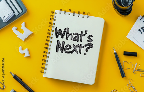 'What's next' written in a notebook, symbolizing future plans and uncertainty.