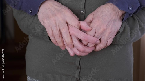 Close-Up of Intertwined Hands of an Elderly Couple Expressing Love and Bond