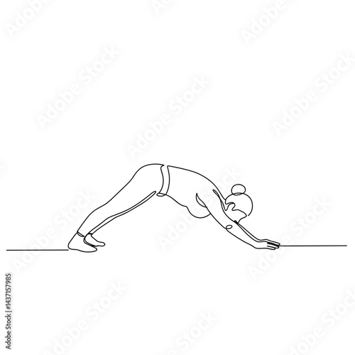 Woman practicing downward dog yoga pose on a minimalistic background  