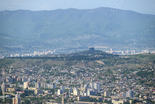 Cityscape of Tbilisi, the capital of Georgia, aerial panoramic view from Mtatsminda Park