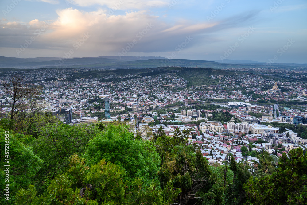Cityscape of Tbilisi, the capital of Georgia, aerial panoramic view from Mtatsminda Park Cityscape of Tbilisi, the capital of Georgia, aerial panoramic view from Mtatsminda Park