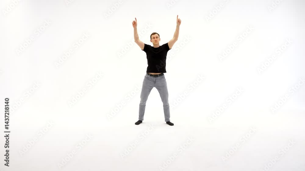 Energetic man dancing and pointing on white background Energetic man dancing and pointing on white background