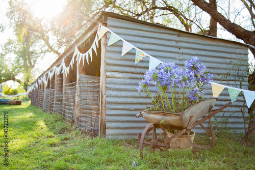 Farm sheds decorated with bunting for country wedding