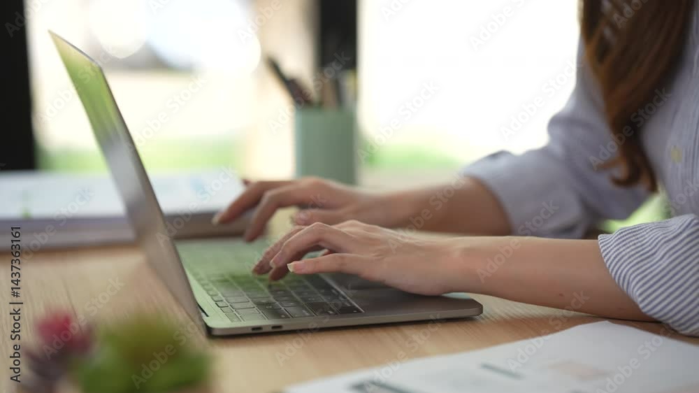 Asian woman hands typing on computer keyboard. Close up panoramic banner. Businesswoman or learner using laptop at home. Online learning, Internet marketing, Working from home, Office work, Freelance Asian woman hands typing on computer keyboard. Close up panoramic banner. Businesswoman or learner using laptop at home. Online learning, Internet marketing, Working from home, Office work, Freelance