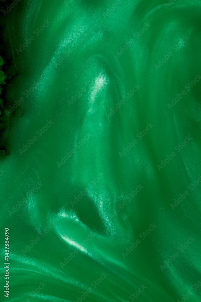 closeup of green epoxy reiain background