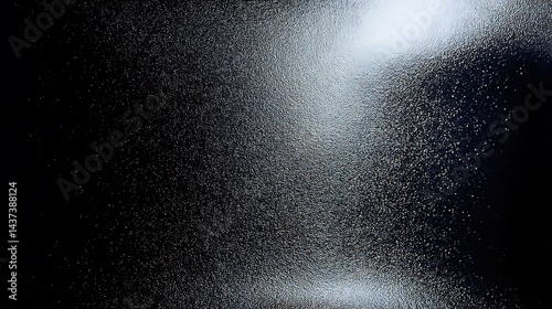Abstract Speckled Background with White and Blue Particles Over Black Space