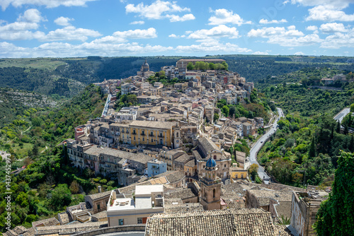 Fototapeta Naklejka Na Ścianę i Meble -  View of the historic center of Ragusa, Sicily, Italy, with its houses cascading over a hill, a UNESCO World Heritage Site.