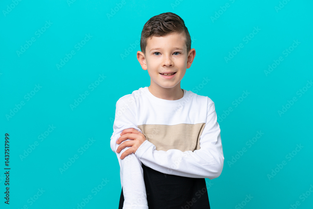 Little kid boy isolated on blue background laughing Little kid boy isolated on blue background laughing