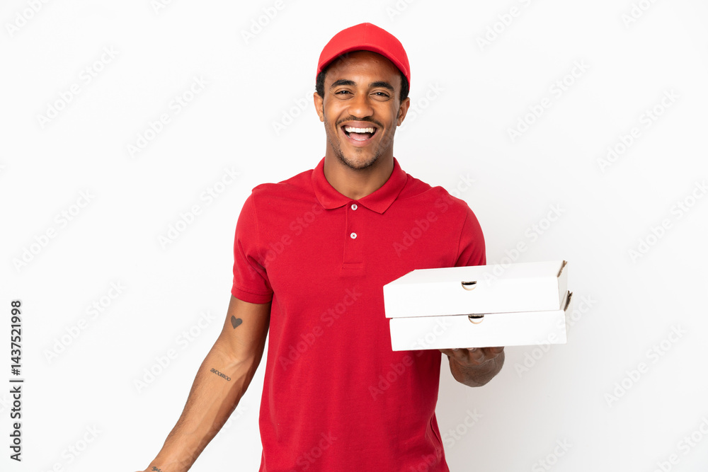 African American pizza delivery man picking up pizza boxes over isolated white wall smiling a lot African American pizza delivery man picking up pizza boxes over isolated white wall smiling a lot