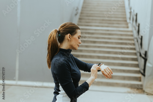 Motivated woman checking he...