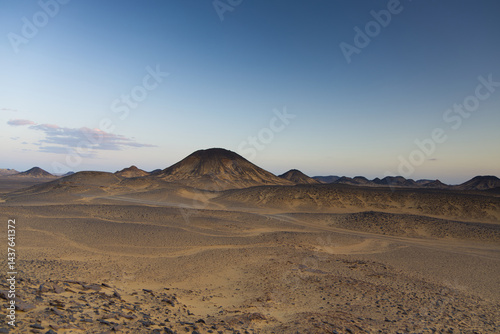 Obraz na płótnie Sunset lights on the black desert in Egypt w salonie