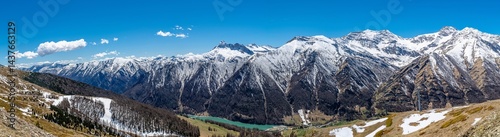 L’arrivo della primavera ai piedi del Monviso: Pontechianale ed il suo lago in Alta Valle Varaita photo