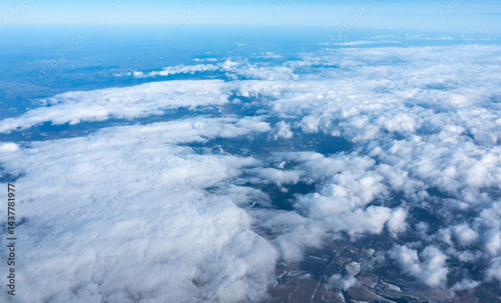 Blue sky with white clouds, flying above cloudy sky texture pattern, cloudscape blurred light