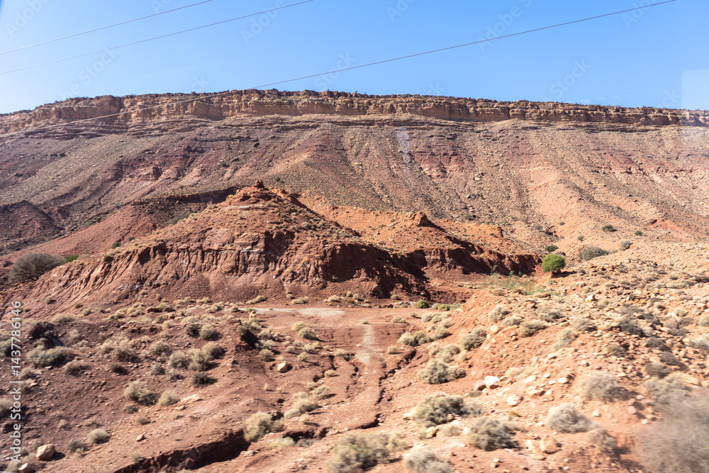 Morocco semi-deserts and mountains, north africa nature, Moroccan stone desert, red hills, villages and argan trees