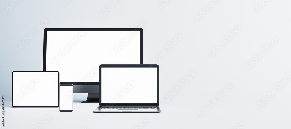 Blank screen mockup of desktop, laptop, tablet, and smartphone on light background for product presentation in clean interior layout. 3D Rendering Blank screen mockup of desktop, laptop, tablet, and smartphone on light background for product presentation in clean interior layout. 3D Rendering