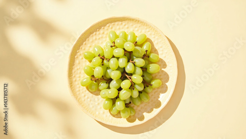Fresh grapes in white plane top view