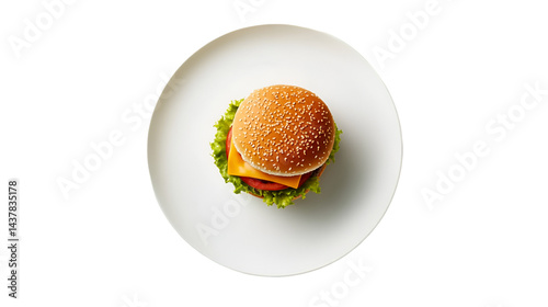 Aerial view of a burger with sesame seed bun on a white plate against black background