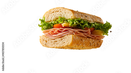 Close up of a sandwich with ham lettuce tomato and cheese on a sesame seed bun halves