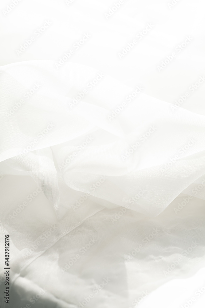 Flowing white fabric, softly illuminated. Delicate texture and subtle shadows create a serene, ethereal atmosphere. Pure and elegant. Flowing white fabric, softly illuminated. Delicate texture and subtle shadows create a serene, ethereal atmosphere. Pure and elegant.