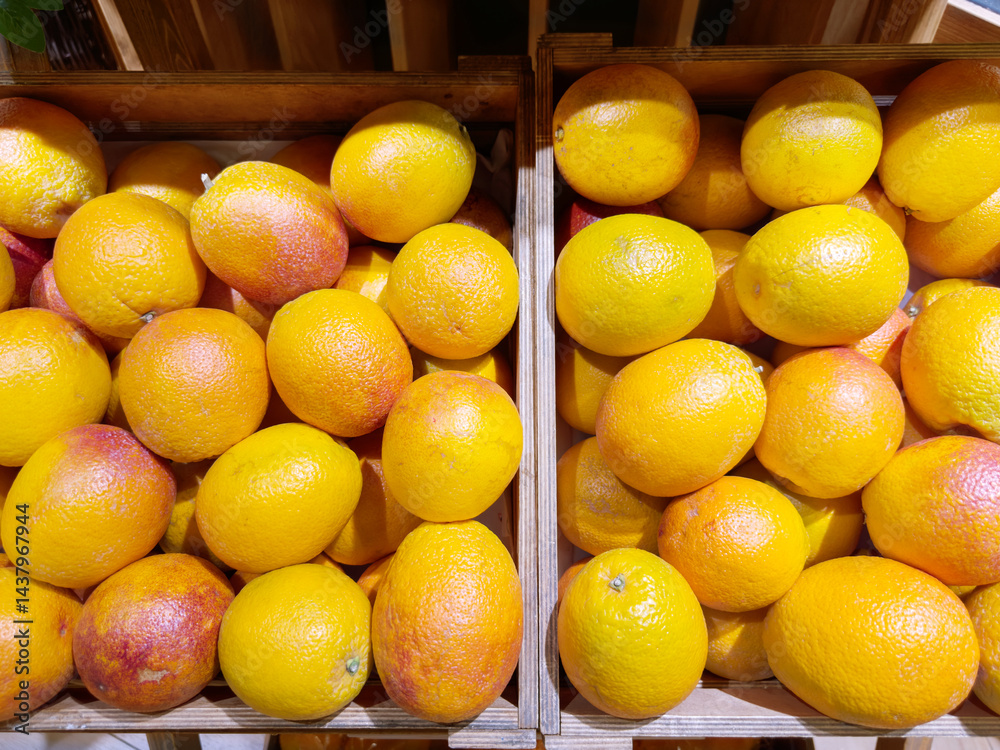 buying fruits red orange at the market