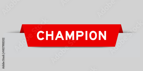 Red color inserted label with word champion on gray background