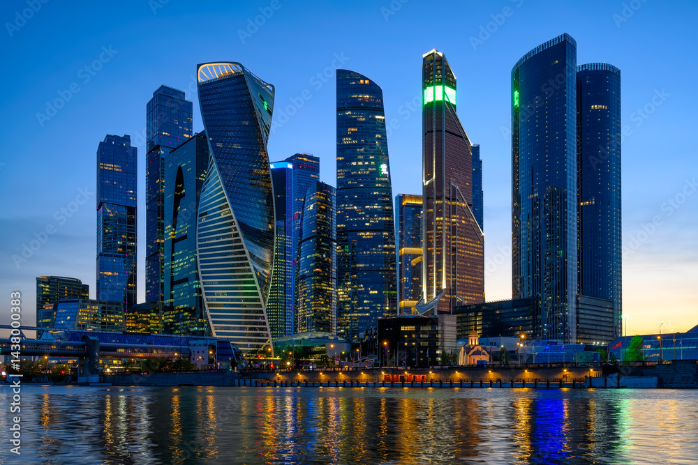 Fototapeta premium Night view of skyscrapers of Moscow City business center and Moscow river in Moscow, Russia, Russia