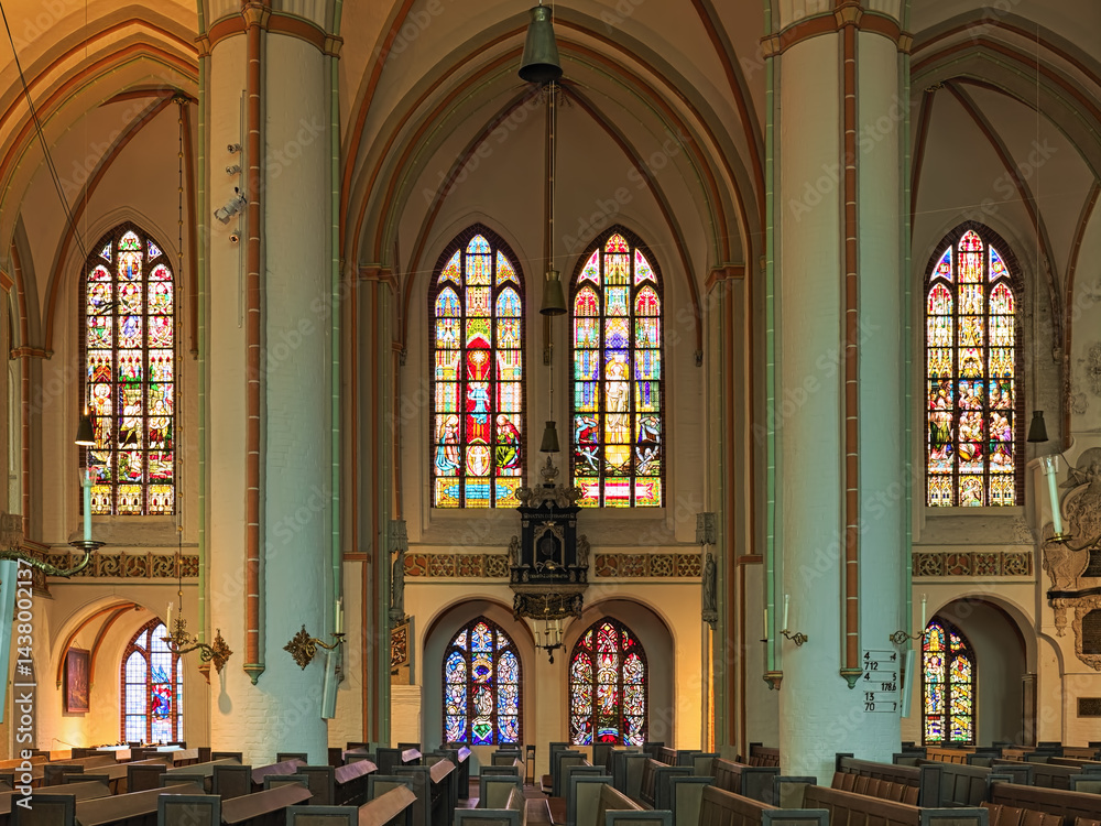 Luneburg, Germany. Stained glass windows in the nave of St. Johannis (Church of John the Baptist). The church was built between 1300 and 1370 and repaired in 1420.