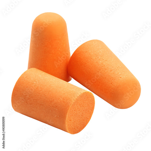 Three orange foam earplugs for noise reduction and hearing protection on black background