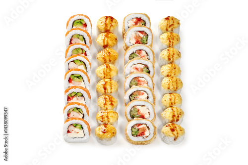 Obraz na płótnie Delicious sushi rolls beautifully arranged on white background w salonie