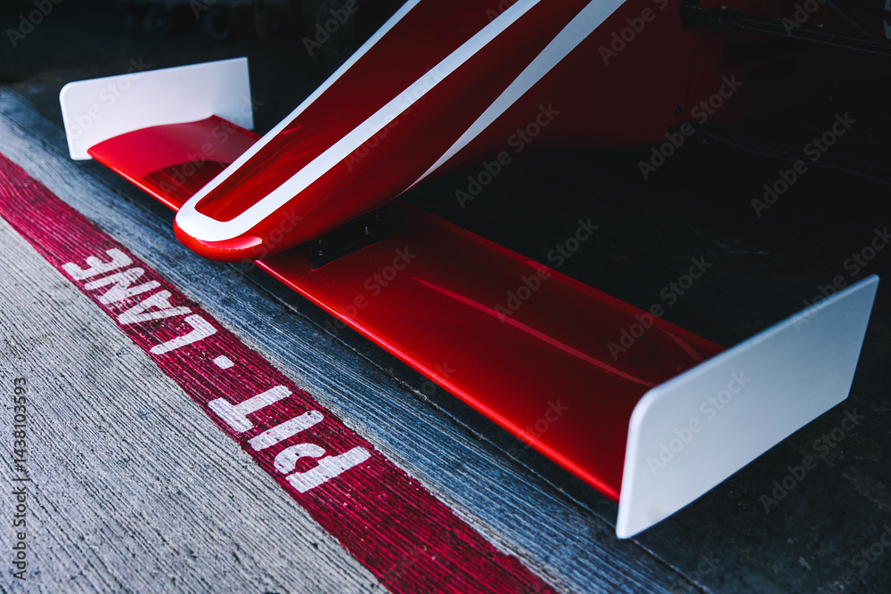 Obraz premium Formula race car in box, red sports car, circuit track pit lane