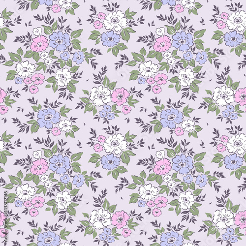 Beautiful floral pattern in small vintage flowers. Small pink, lilac and white flowers. Gray background. Ditsy print. Floral seamless background. Gentle template for fashion prints. Stock pattern