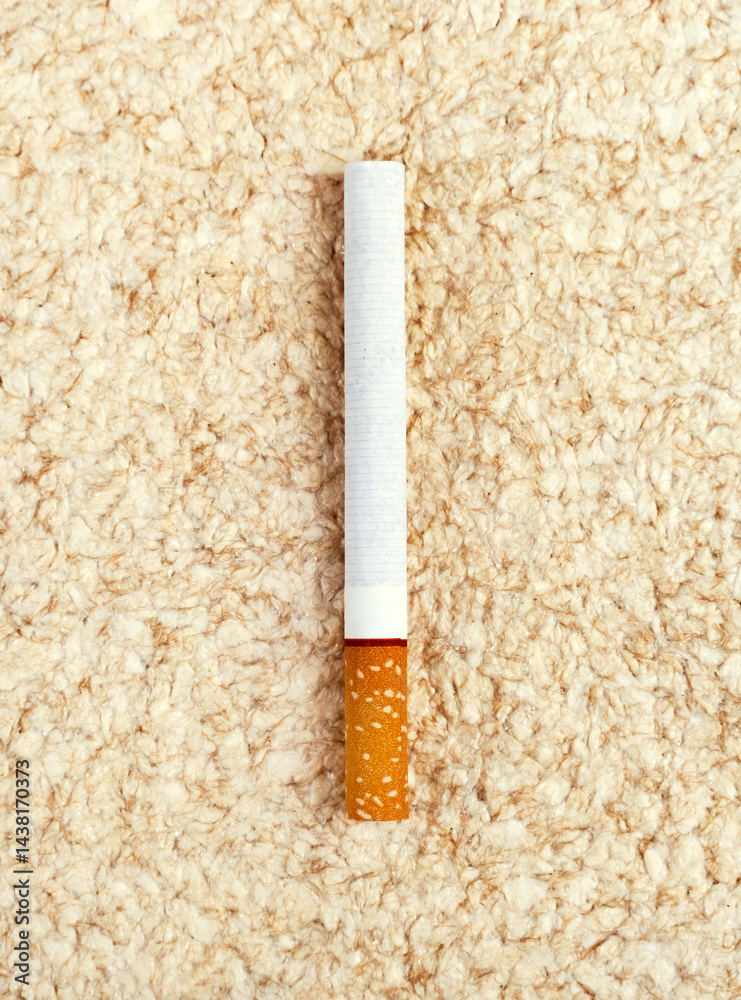 Cigarette on Textile Background