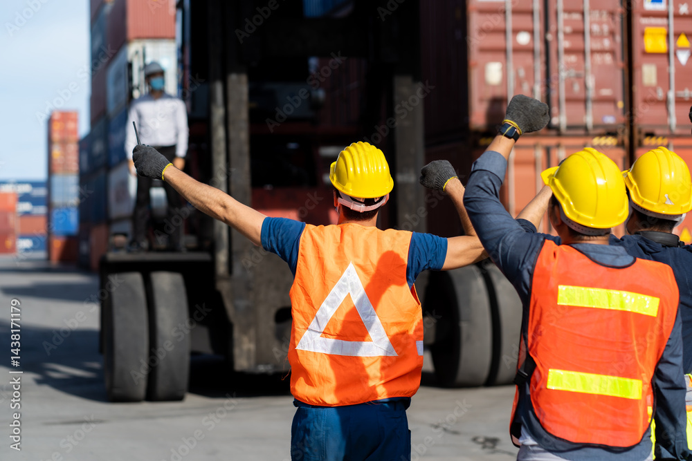 Strike of workers in container yard. Group of multiethnic engineer people during a protest in workplace