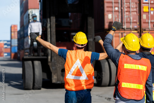 Obraz na płótnie Strike of workers in container yard. Group of multiethnic engineer people during a protest in workplace w salonie