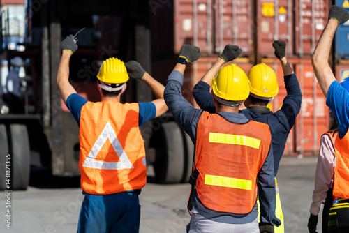 Obraz na płótnie Strike of workers in container yard. Group of multiethnic engineer people during a protest in workplace w salonie