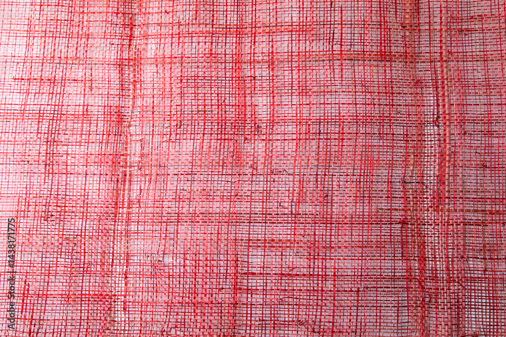 Top view Background texture of red cotton woven fabric.