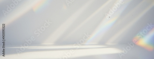 Diagonal beams of bright light stream across with distinct shadows, scattered patches of vibrant rainbow refractions on transparent background